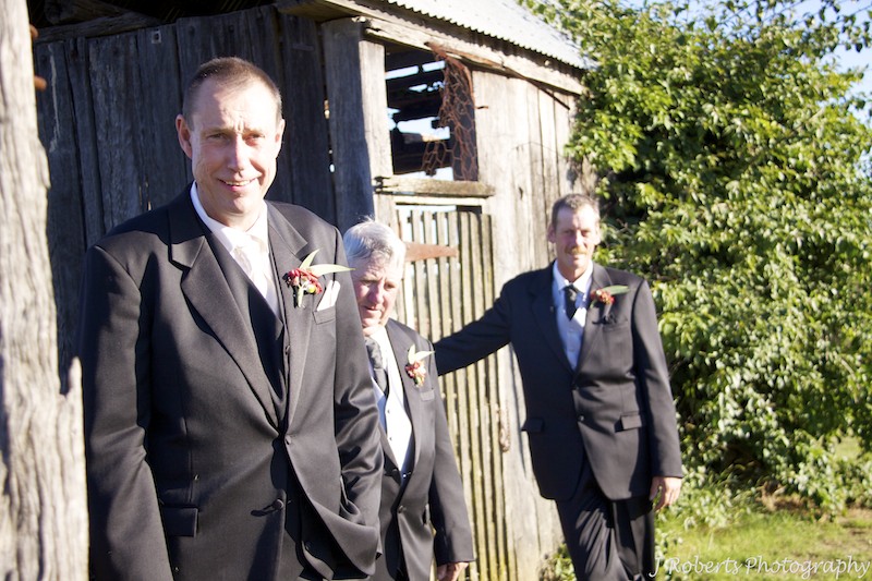 Groom with groomsmen on farm - wedding photography sydney